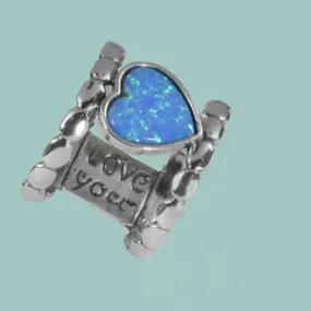 Bluenoemi Sterling silver ring for woman set with a blue opal heart. Love you message.