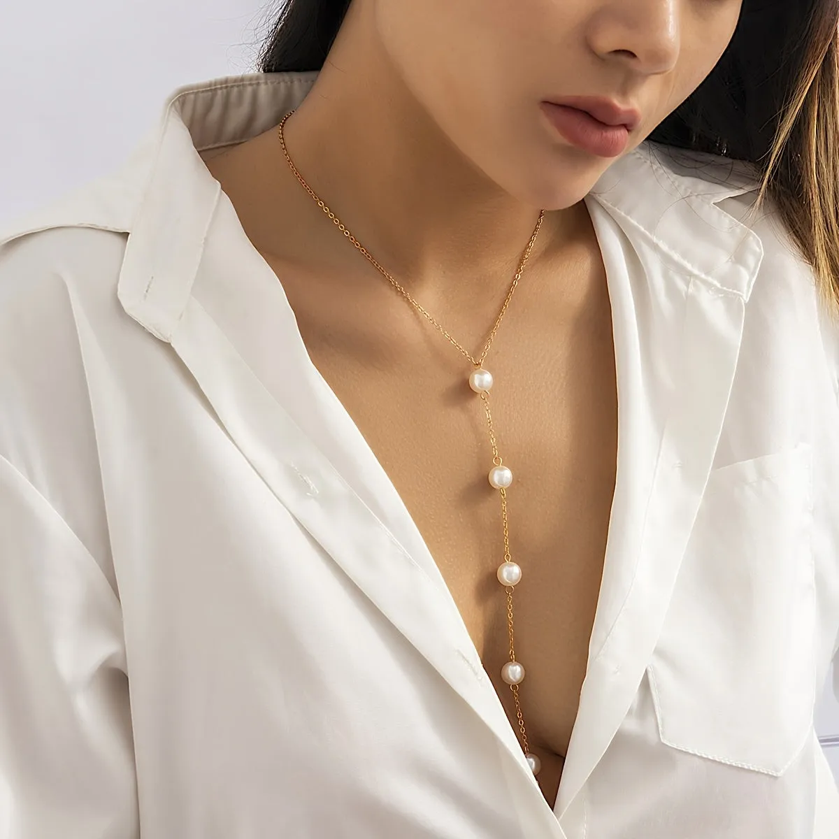 Enhance Your Style with Our Simple and Sexy Pearl Pendant Back Chain Necklace