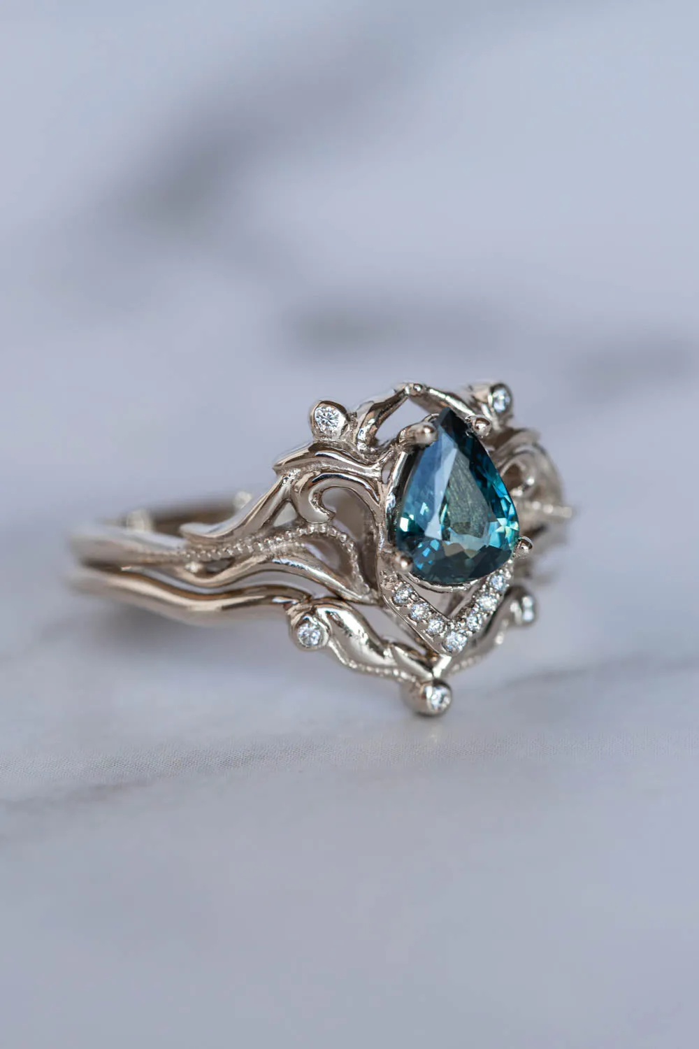 Gold engagement ring set with natural teal sapphire and diamonds / Lida small