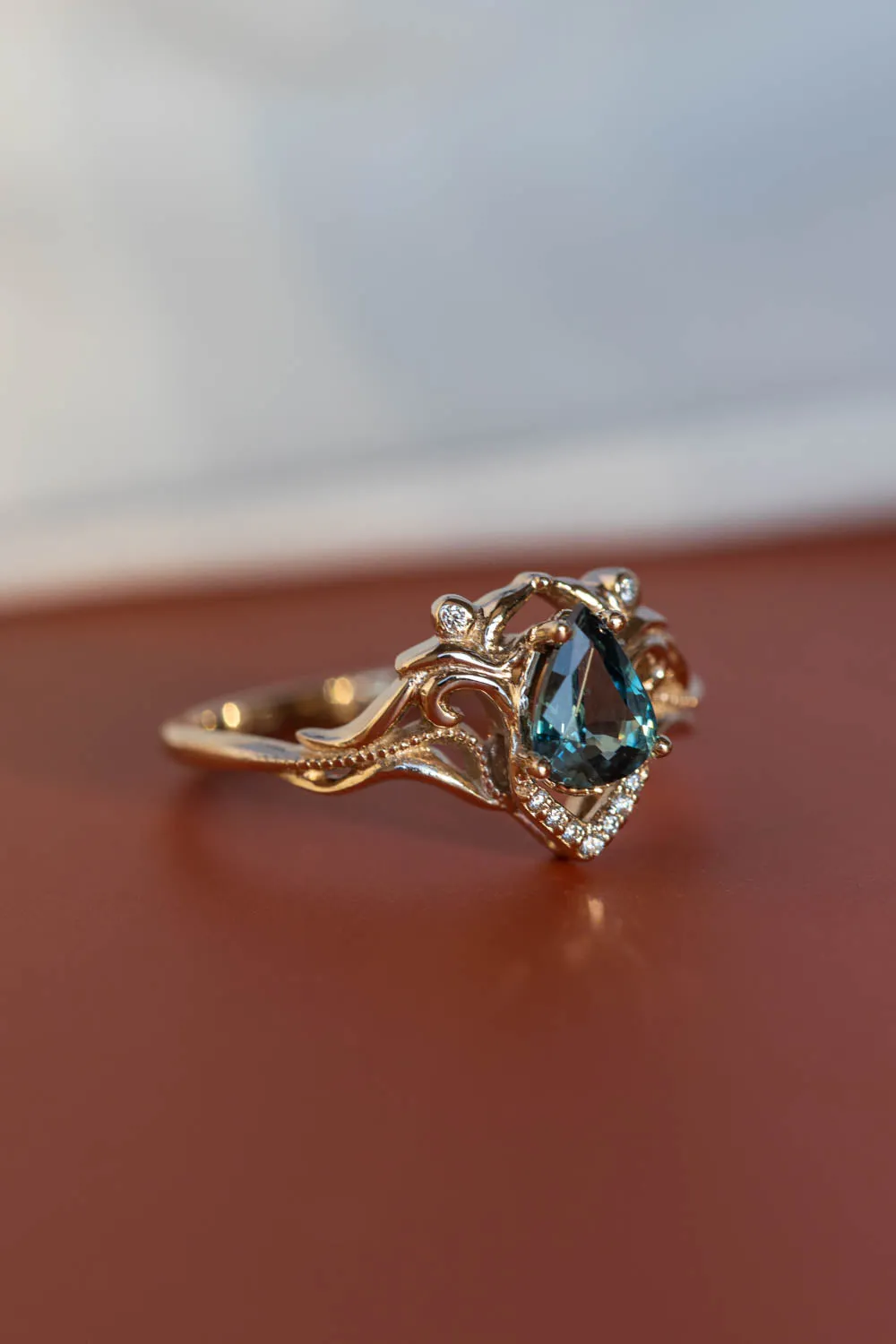 Gold engagement ring set with natural teal sapphire and diamonds / Lida small