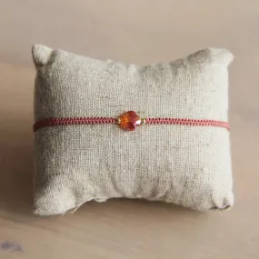 Macramé bracelet with clover - coral