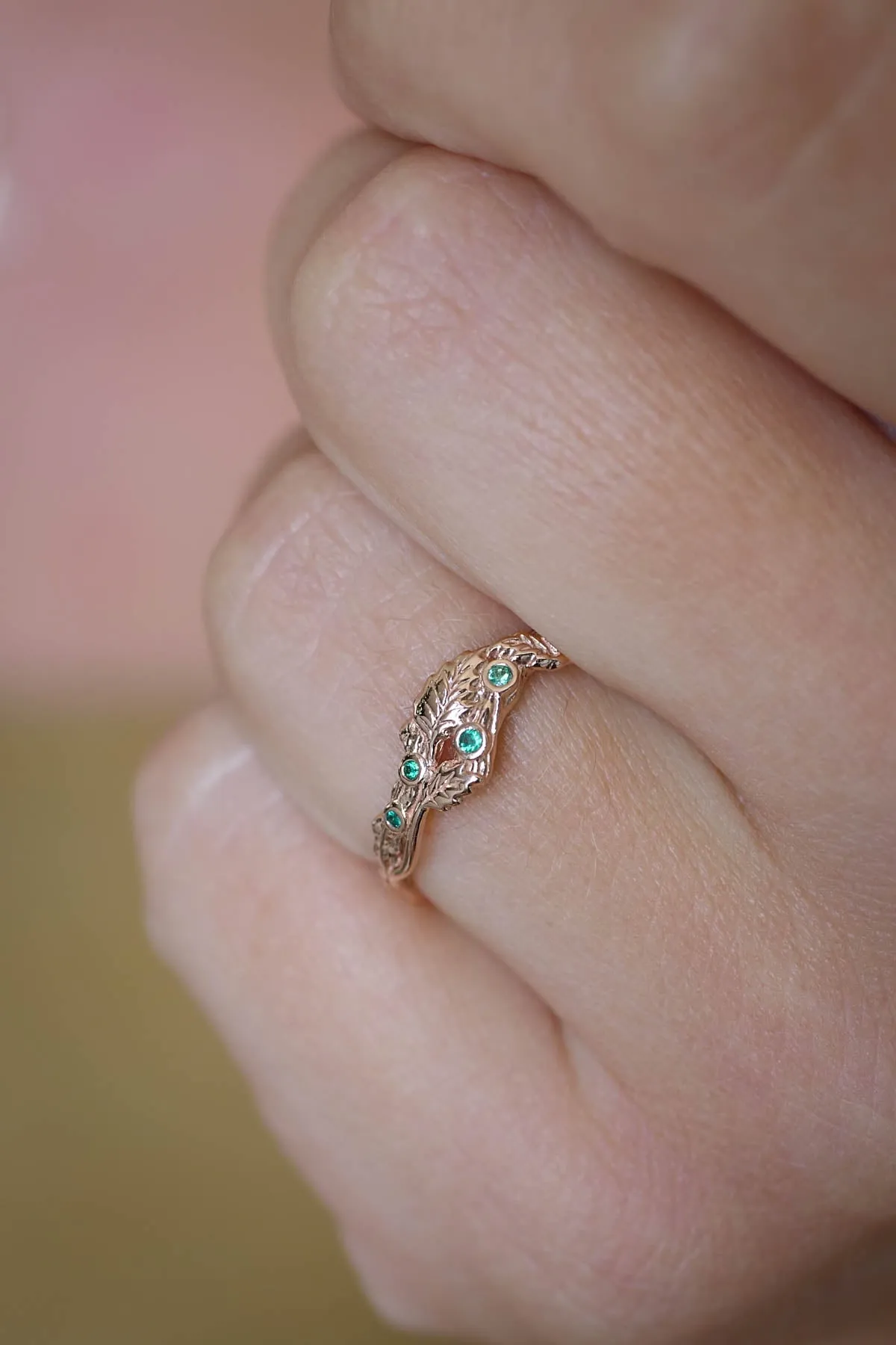 Twig wedding band with emeralds and three leaves, branch wedding ring