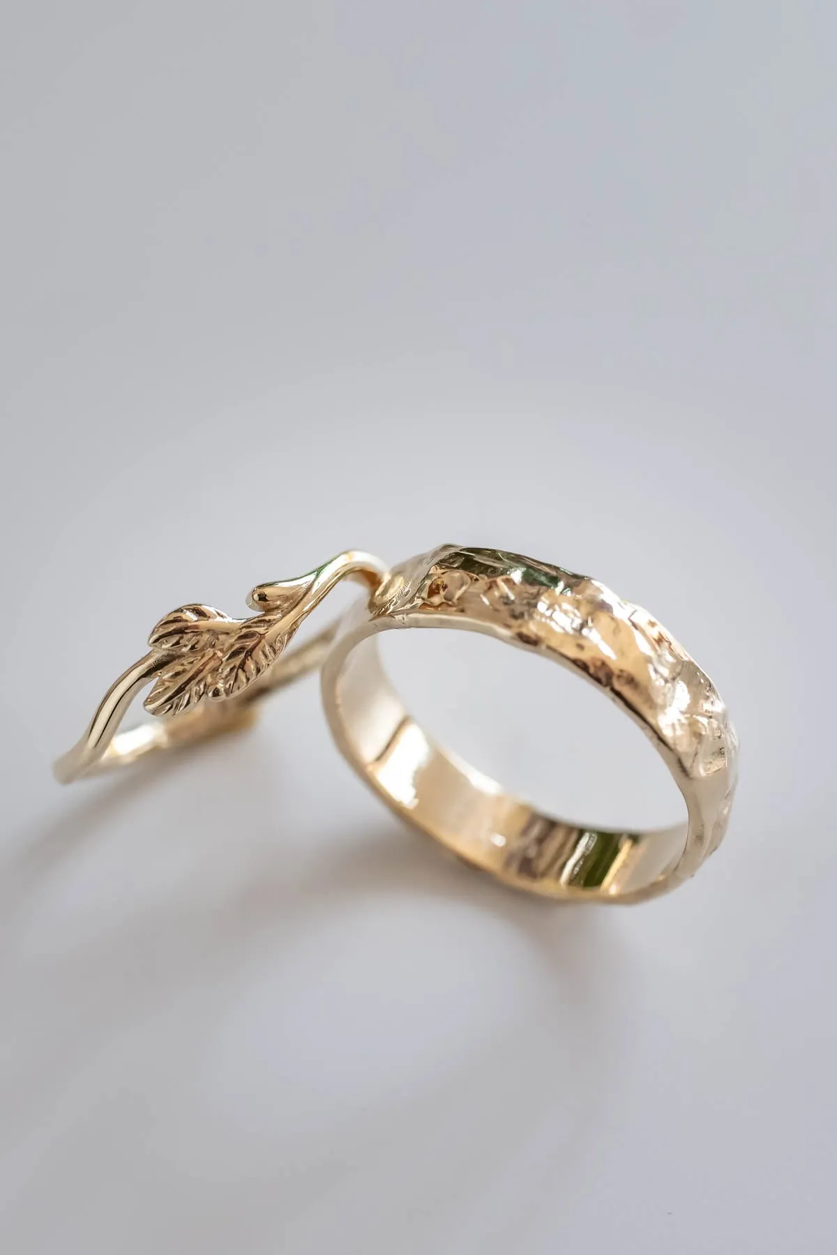 Wedding rings set for couple: textured band for him, twig band for her